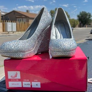 Silver heels; size 6; only used twice and still in great condition